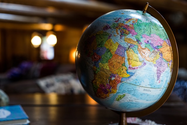 Desk globe. Image credit: Kyle Glenn @ Unsplash https://unsplash.com/photos/desk-globe-on-table-nXt5HtLmlgE